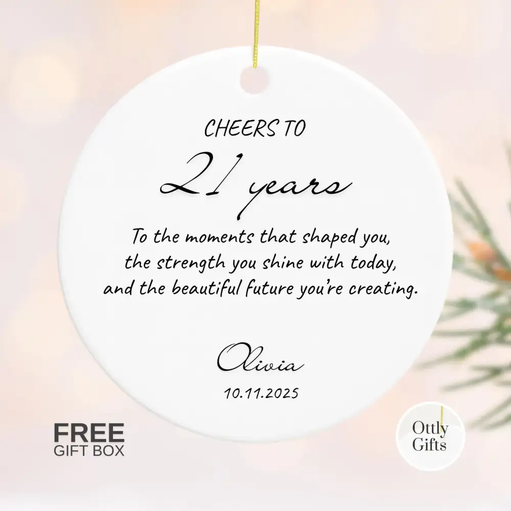 Ottly’s personalized Cheers to 21 Years ceramic ornament with gold lettering and a custom name