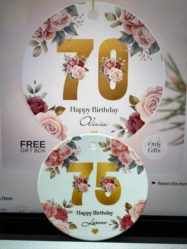 Real Ottly product photo of a personalized 70th birthday ceramic ornament with gold 70 lettering and pink floral decoration